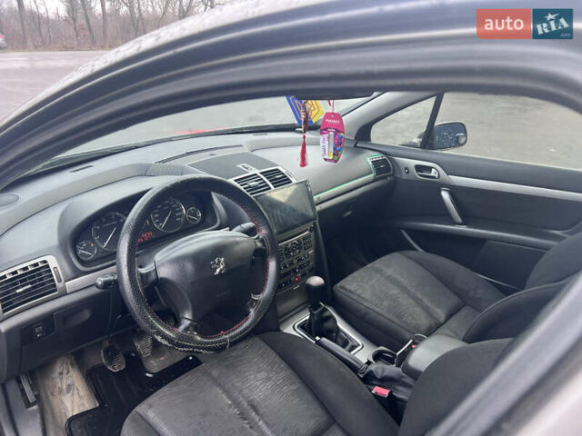 Коричневый Пежо 407, объемом двигателя 1.75 л и пробегом 262 тыс. км за 3950 $, фото 11 на Automoto.ua