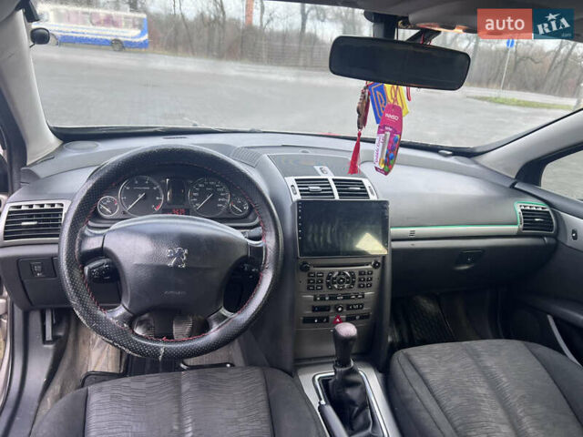 Коричневый Пежо 407, объемом двигателя 1.75 л и пробегом 262 тыс. км за 3950 $, фото 12 на Automoto.ua