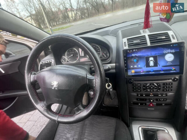 Коричневый Пежо 407, объемом двигателя 1.75 л и пробегом 262 тыс. км за 3950 $, фото 19 на Automoto.ua