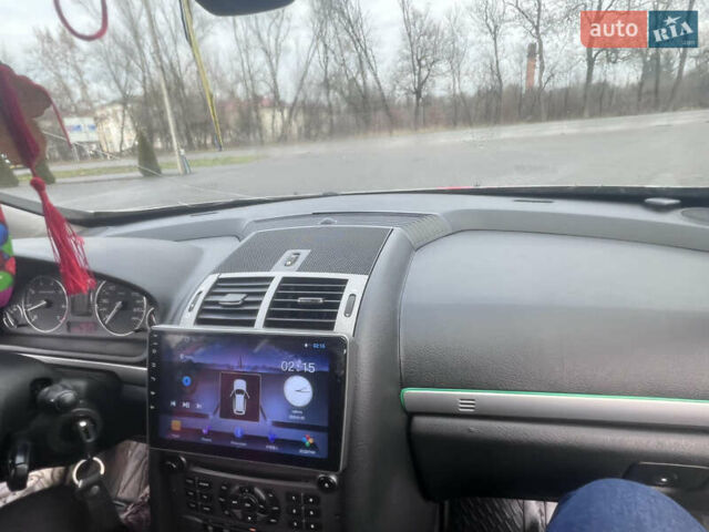 Коричневый Пежо 407, объемом двигателя 1.75 л и пробегом 262 тыс. км за 3950 $, фото 18 на Automoto.ua