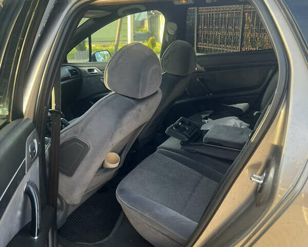 Пежо 407 2005 в Калуше на Automoto.ua Коричневый Пежо 407, объемом двигателя 2 л и пробегом 300 тыс. км за 1950 $, фото 7 на Automoto.ua