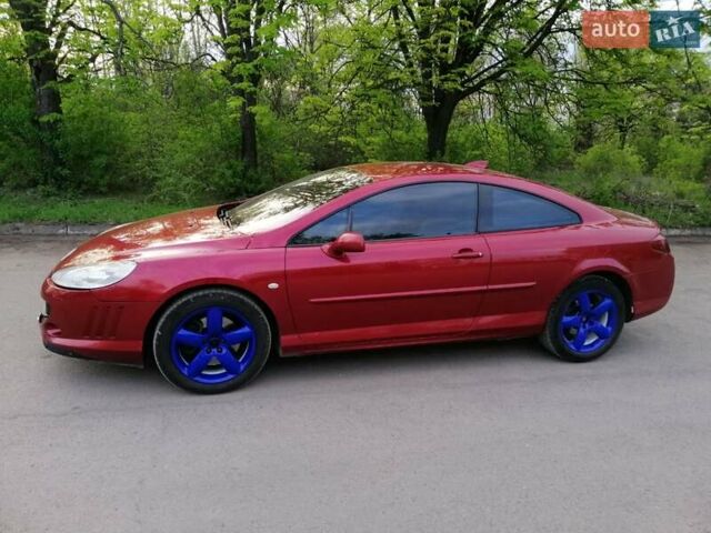 Червоний Пежо 407, об'ємом двигуна 3 л та пробігом 235 тис. км за 5700 $, фото 4 на Automoto.ua