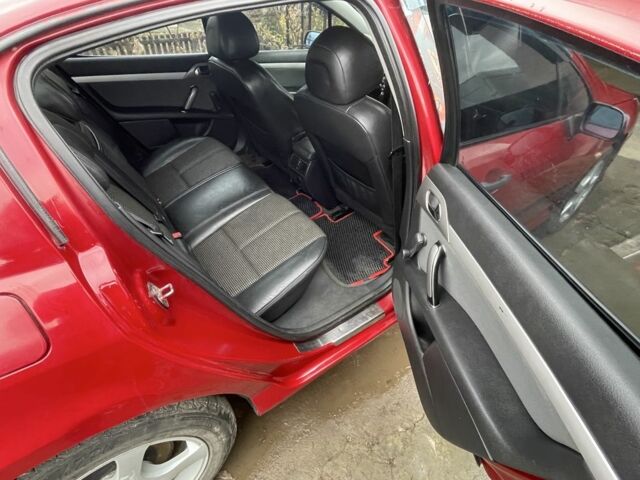 Пежо 407 2005 в Гайсине на Automoto.ua Красный Пежо 407, объемом двигателя 1.7 л и пробегом 246 тыс. км за 3000 $, фото 5 на Automoto.ua