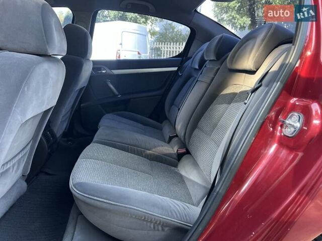Красный Пежо 407, объемом двигателя 2 л и пробегом 208 тыс. км за 4900 $, фото 7 на Automoto.ua