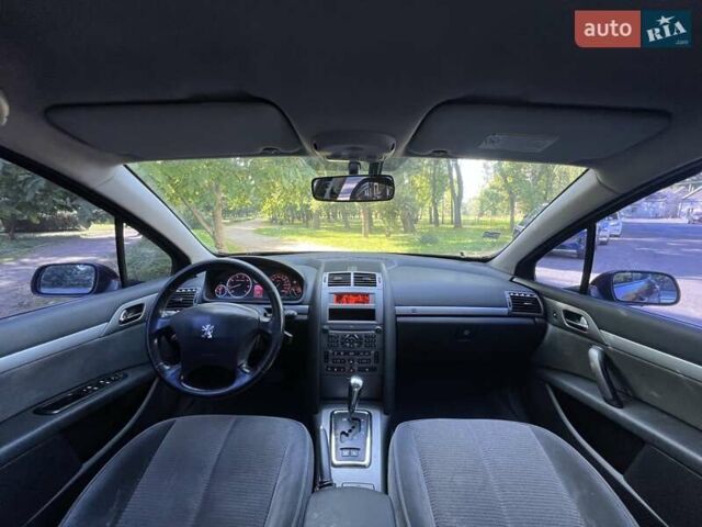 Красный Пежо 407, объемом двигателя 2 л и пробегом 208 тыс. км за 4900 $, фото 5 на Automoto.ua