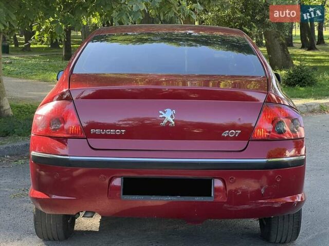 Красный Пежо 407, объемом двигателя 2 л и пробегом 208 тыс. км за 4900 $, фото 4 на Automoto.ua