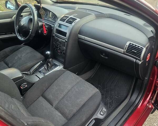 Красный Пежо 407, объемом двигателя 1.75 л и пробегом 303 тыс. км за 4500 $, фото 16 на Automoto.ua