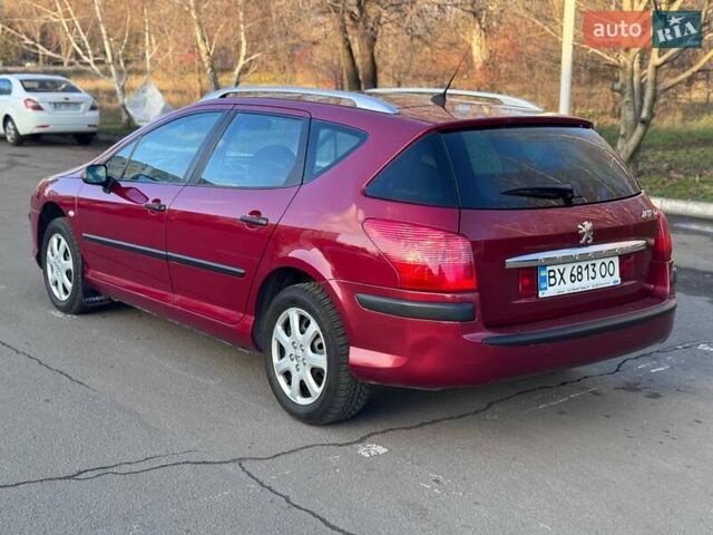 Красный Пежо 407, объемом двигателя 1.8 л и пробегом 306 тыс. км за 3999 $, фото 7 на Automoto.ua