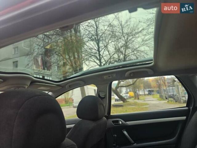 Красный Пежо 407, объемом двигателя 1.75 л и пробегом 305 тыс. км за 3450 $, фото 15 на Automoto.ua
