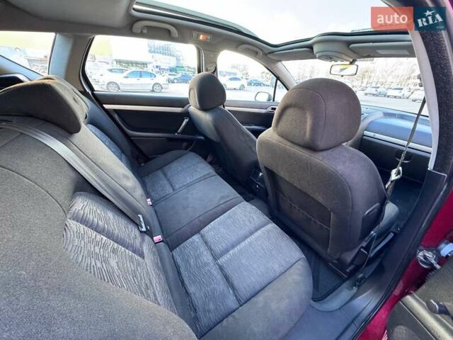 Красный Пежо 407, объемом двигателя 1.8 л и пробегом 306 тыс. км за 3999 $, фото 12 на Automoto.ua