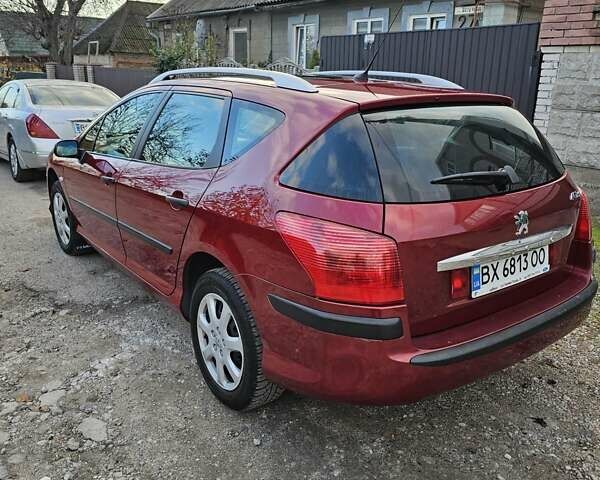 Красный Пежо 407, объемом двигателя 1.75 л и пробегом 303 тыс. км за 4500 $, фото 3 на Automoto.ua