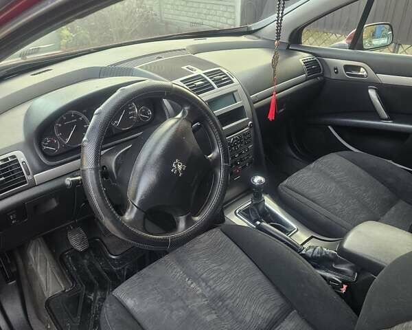 Красный Пежо 407, объемом двигателя 1.75 л и пробегом 303 тыс. км за 4500 $, фото 23 на Automoto.ua