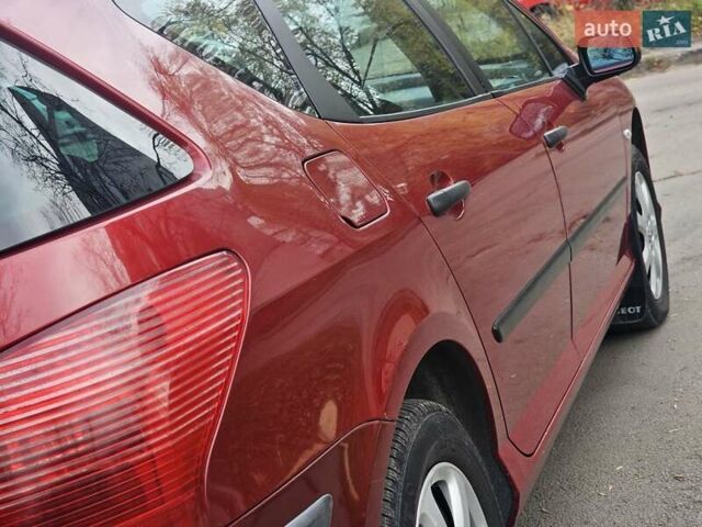 Красный Пежо 407, объемом двигателя 1.75 л и пробегом 305 тыс. км за 3450 $, фото 11 на Automoto.ua