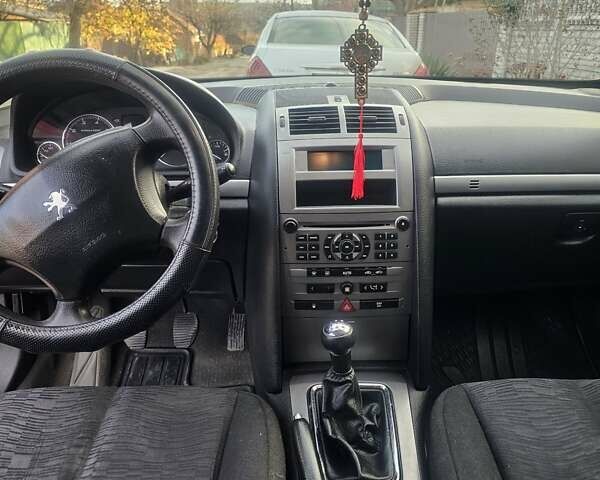 Красный Пежо 407, объемом двигателя 1.75 л и пробегом 303 тыс. км за 4500 $, фото 27 на Automoto.ua