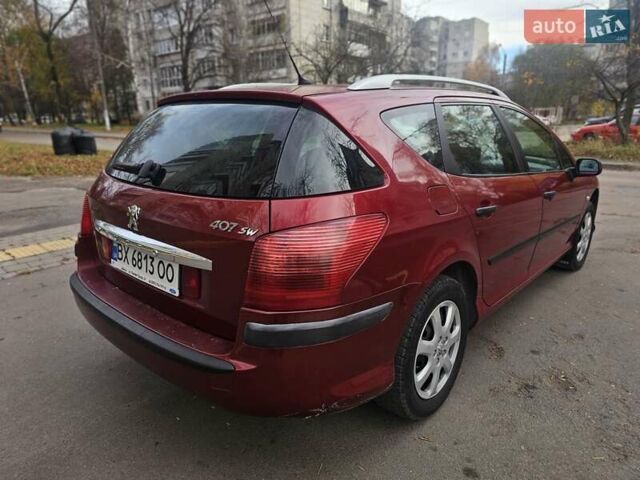 Красный Пежо 407, объемом двигателя 1.75 л и пробегом 305 тыс. км за 3450 $, фото 2 на Automoto.ua