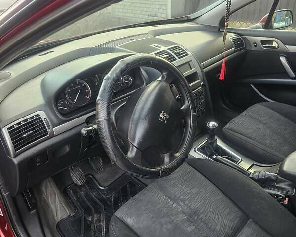 Красный Пежо 407, объемом двигателя 1.75 л и пробегом 303 тыс. км за 4500 $, фото 26 на Automoto.ua