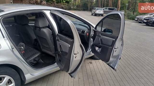 Сірий Пежо 407, об'ємом двигуна 1.8 л та пробігом 266 тис. км за 5000 $, фото 5 на Automoto.ua