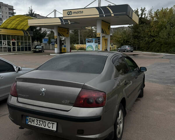 Серый Пежо 407, объемом двигателя 1.56 л и пробегом 275 тыс. км за 3400 $, фото 2 на Automoto.ua