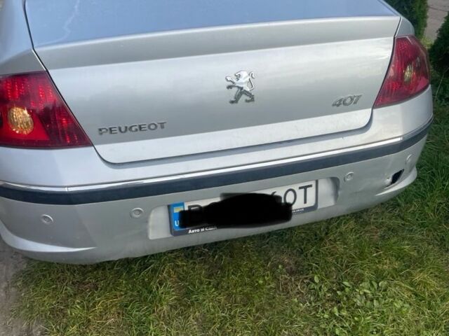 Серый Пежо 407, объемом двигателя 2 л и пробегом 280 тыс. км за 4000 $, фото 1 на Automoto.ua