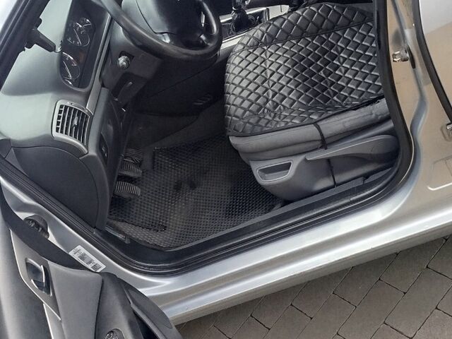 Серый Пежо 407, объемом двигателя 1.7 л и пробегом 266 тыс. км за 5000 $, фото 7 на Automoto.ua