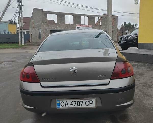 Серый Пежо 407, объемом двигателя 1.8 л и пробегом 193 тыс. км за 2999 $, фото 4 на Automoto.ua