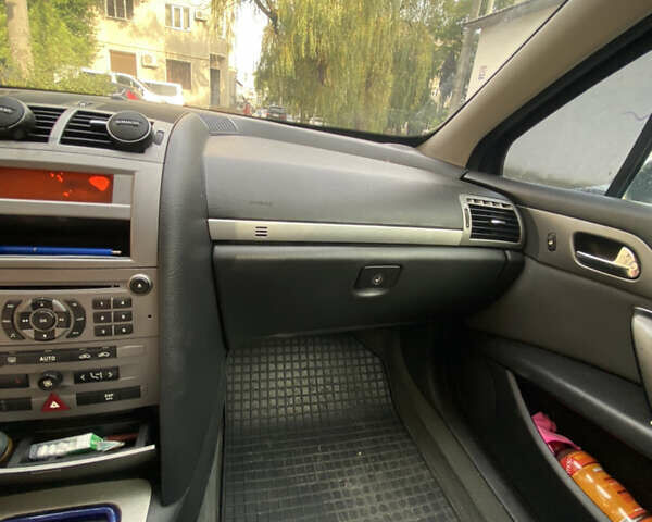 Серый Пежо 407, объемом двигателя 1.8 л и пробегом 233 тыс. км за 3600 $, фото 1 на Automoto.ua