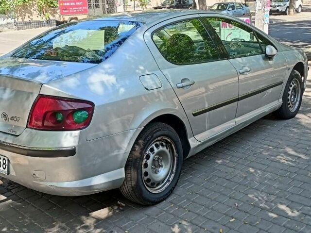 Сірий Пежо 407, об'ємом двигуна 2 л та пробігом 455 тис. км за 2100 $, фото 9 на Automoto.ua
