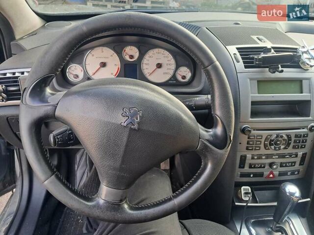 Серый Пежо 407, объемом двигателя 2.01 л и пробегом 370 тыс. км за 5550 $, фото 7 на Automoto.ua