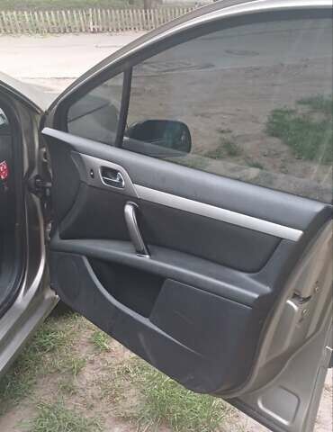 Серый Пежо 407, объемом двигателя 1.8 л и пробегом 220 тыс. км за 3500 $, фото 11 на Automoto.ua