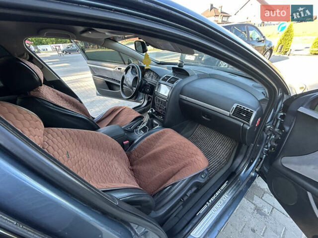 Серый Пежо 407, объемом двигателя 2 л и пробегом 249 тыс. км за 4600 $, фото 17 на Automoto.ua