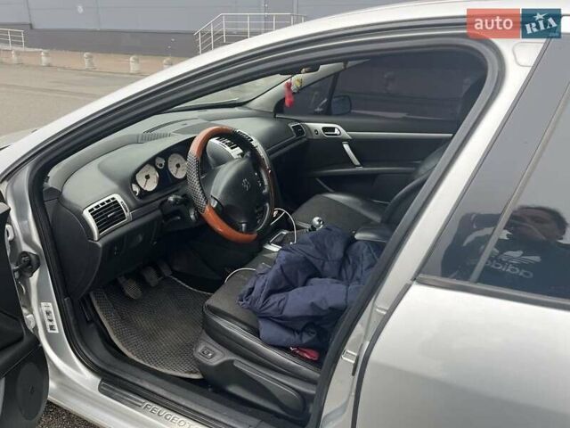Серый Пежо 407, объемом двигателя 2 л и пробегом 250 тыс. км за 4700 $, фото 2 на Automoto.ua