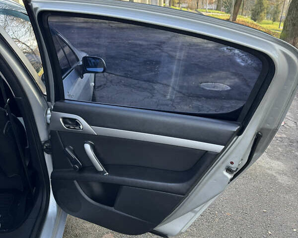 Сірий Пежо 407, об'ємом двигуна 1.75 л та пробігом 182 тис. км за 3750 $, фото 12 на Automoto.ua