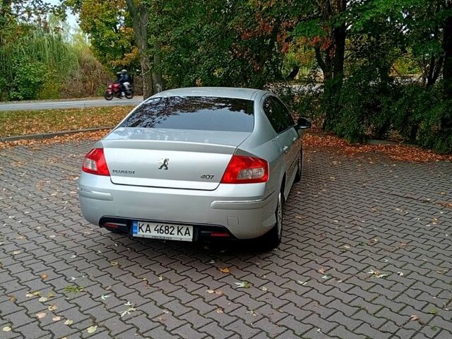 Серый Пежо 407, объемом двигателя 2 л и пробегом 221 тыс. км за 6300 $, фото 1 на Automoto.ua