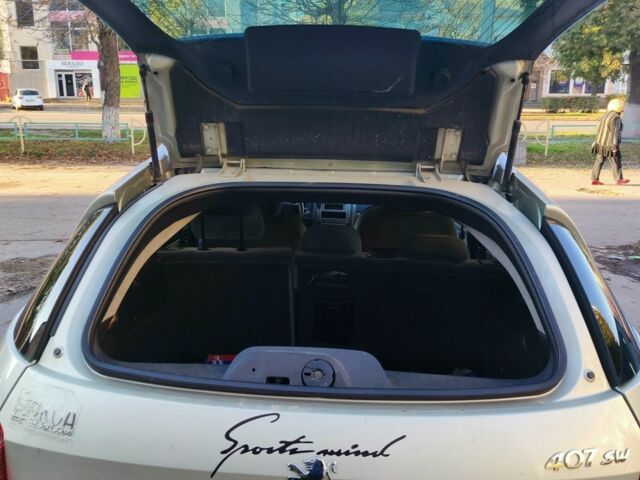 Серый Пежо 407, объемом двигателя 2 л и пробегом 375 тыс. км за 2500 $, фото 9 на Automoto.ua