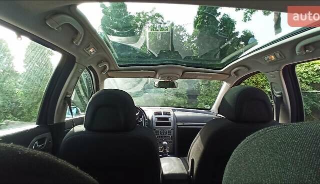 Серый Пежо 407, объемом двигателя 2 л и пробегом 251 тыс. км за 4200 $, фото 10 на Automoto.ua