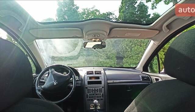 Серый Пежо 407, объемом двигателя 2 л и пробегом 251 тыс. км за 4200 $, фото 2 на Automoto.ua