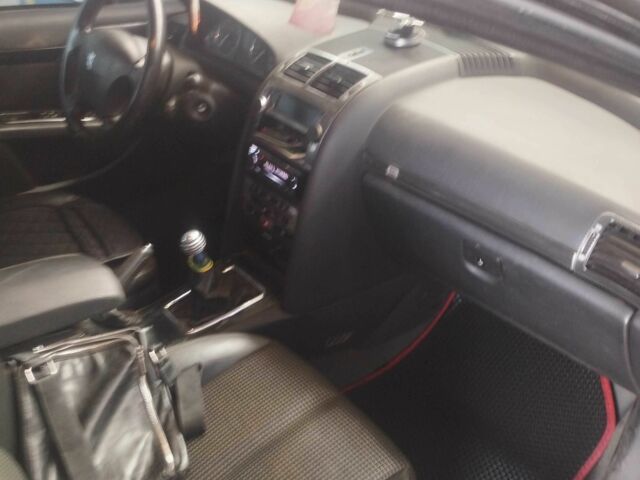 Серый Пежо 407, объемом двигателя 1.7 л и пробегом 232 тыс. км за 3400 $, фото 5 на Automoto.ua