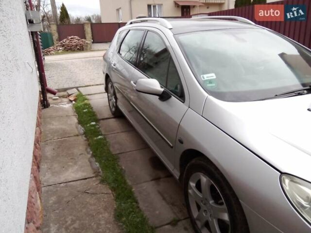 Серый Пежо 407, объемом двигателя 2 л и пробегом 226 тыс. км за 4500 $, фото 1 на Automoto.ua
