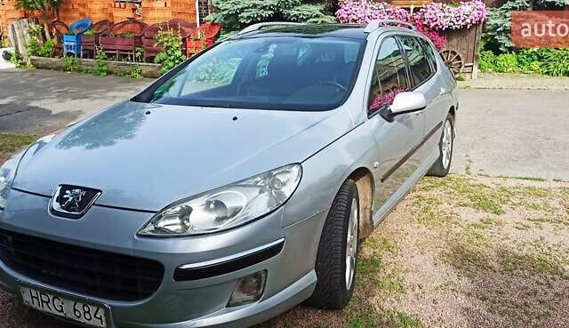 Серый Пежо 407, объемом двигателя 2 л и пробегом 251 тыс. км за 4200 $, фото 1 на Automoto.ua