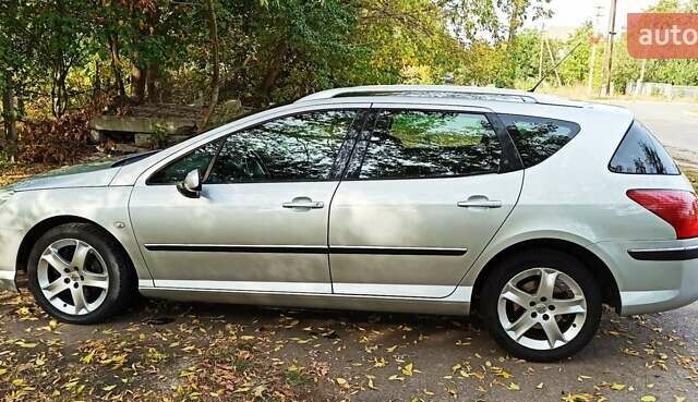 Серый Пежо 407, объемом двигателя 2 л и пробегом 251 тыс. км за 4200 $, фото 6 на Automoto.ua