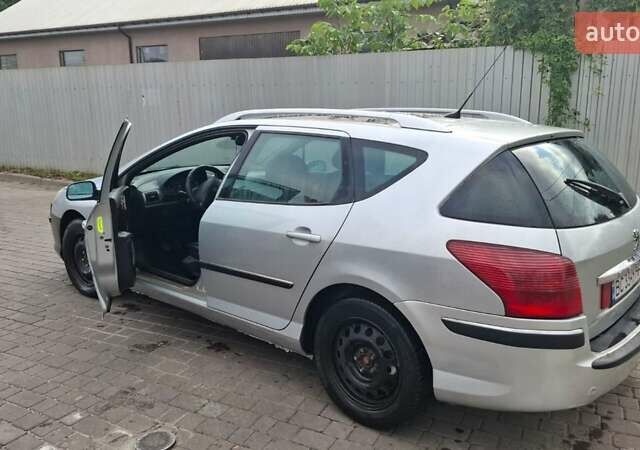 Серый Пежо 407, объемом двигателя 2 л и пробегом 264 тыс. км за 3700 $, фото 1 на Automoto.ua