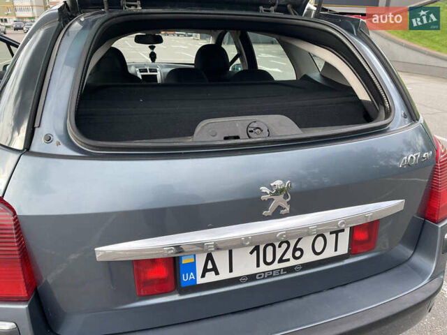 Сірий Пежо 407, об'ємом двигуна 2 л та пробігом 262 тис. км за 5100 $, фото 6 на Automoto.ua
