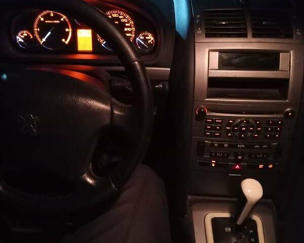 Серый Пежо 407, объемом двигателя 2 л и пробегом 314 тыс. км за 3490 $, фото 2 на Automoto.ua