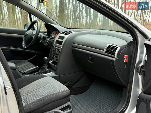 Сірий Пежо 407, об'ємом двигуна 1.56 л та пробігом 298 тис. км за 3799 $, фото 12 на Automoto.ua