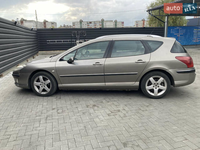 Серый Пежо 407, объемом двигателя 2 л и пробегом 305 тыс. км за 3800 $, фото 1 на Automoto.ua