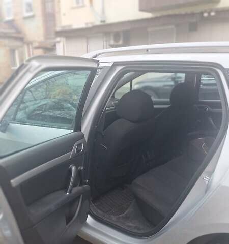 Сірий Пежо 407, об'ємом двигуна 2 л та пробігом 310 тис. км за 3700 $, фото 9 на Automoto.ua