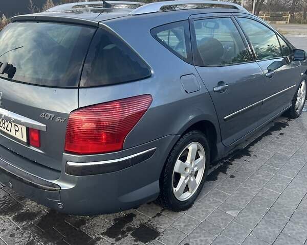 Серый Пежо 407, объемом двигателя 1.6 л и пробегом 302 тыс. км за 4599 $, фото 3 на Automoto.ua