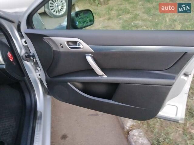 Сірий Пежо 407, об'ємом двигуна 1.56 л та пробігом 235 тис. км за 3500 $, фото 6 на Automoto.ua