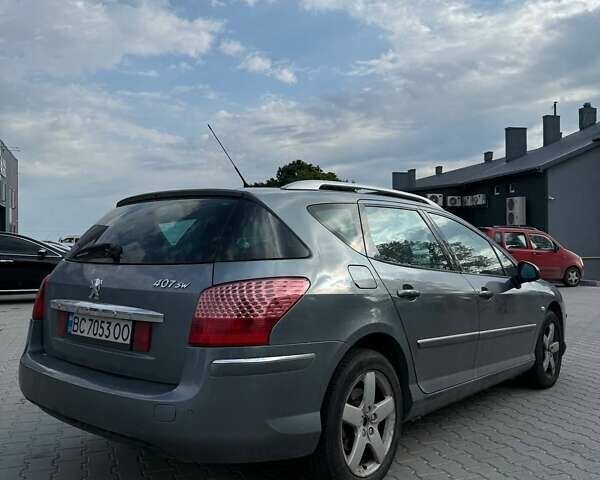 Серый Пежо 407, объемом двигателя 2 л и пробегом 330 тыс. км за 7500 $, фото 1 на Automoto.ua