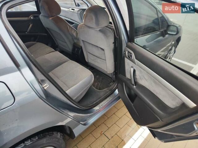 Синій Пежо 407, об'ємом двигуна 2 л та пробігом 255 тис. км за 3850 $, фото 11 на Automoto.ua